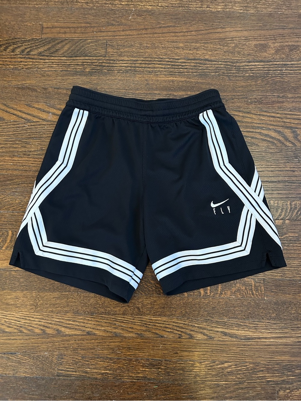 Nike Black Men’s Athletic Shorts with White Stripe Accents